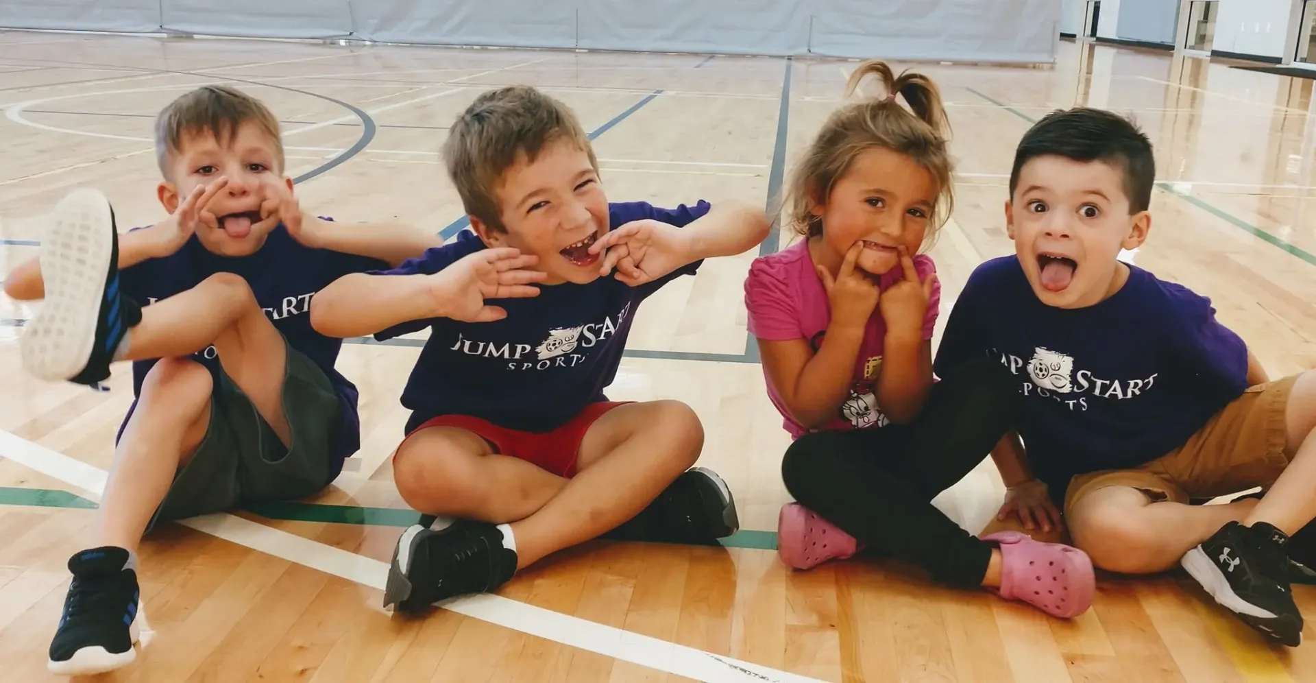 Children playing sports at Jumpstart Sports camp on the Melissa Campus
