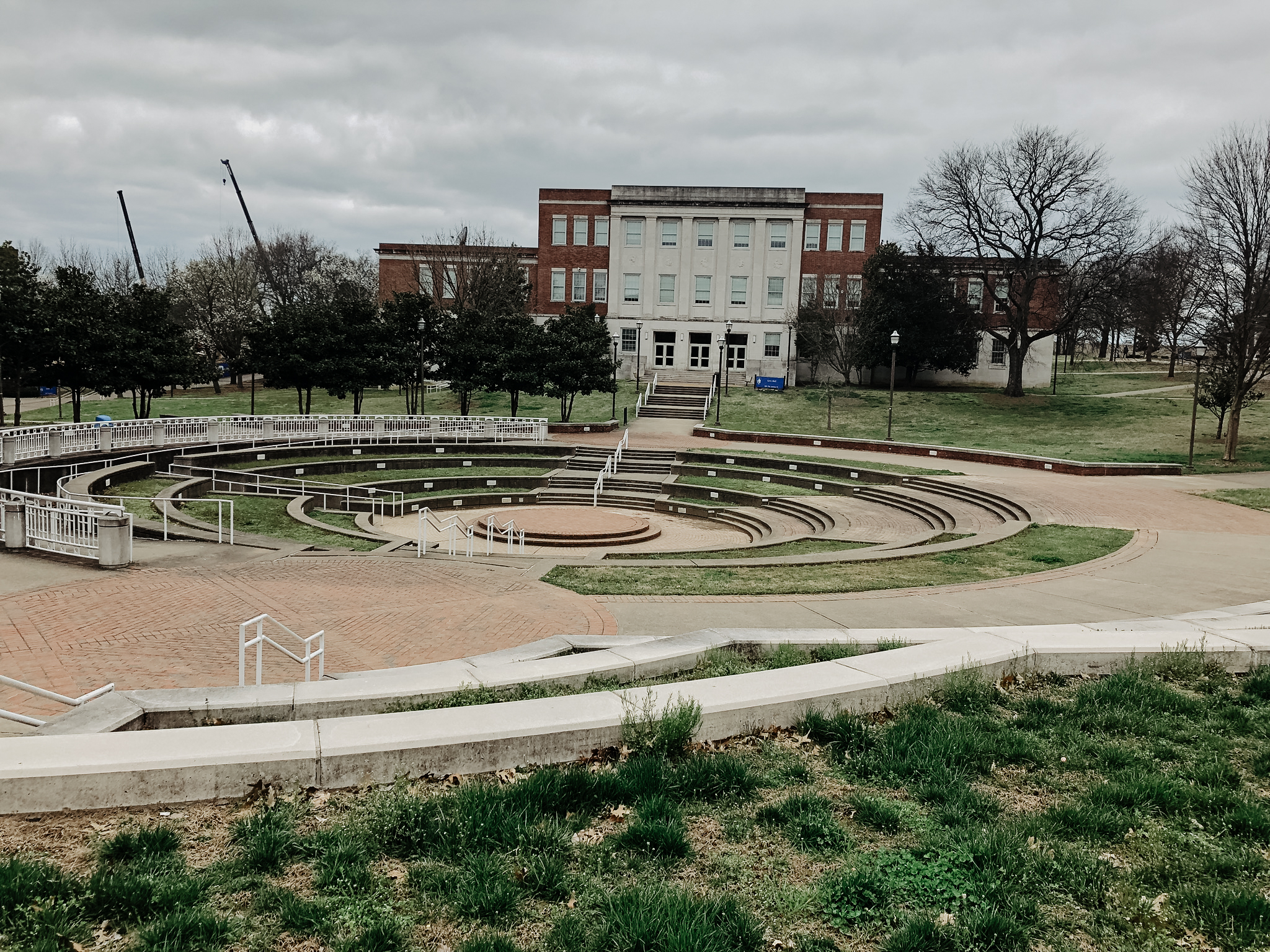 Photograph of Laura Averitte Amphitheater, 2019. The Harold Love Sr. Student Success Center, formerly Memorial Library, and some construction equipment and visible on the other side of the amphitheater. This area was formerly part of Centennial Boulvard, but was closed to traffic in the 1970s. Image courtesy of MHCF.