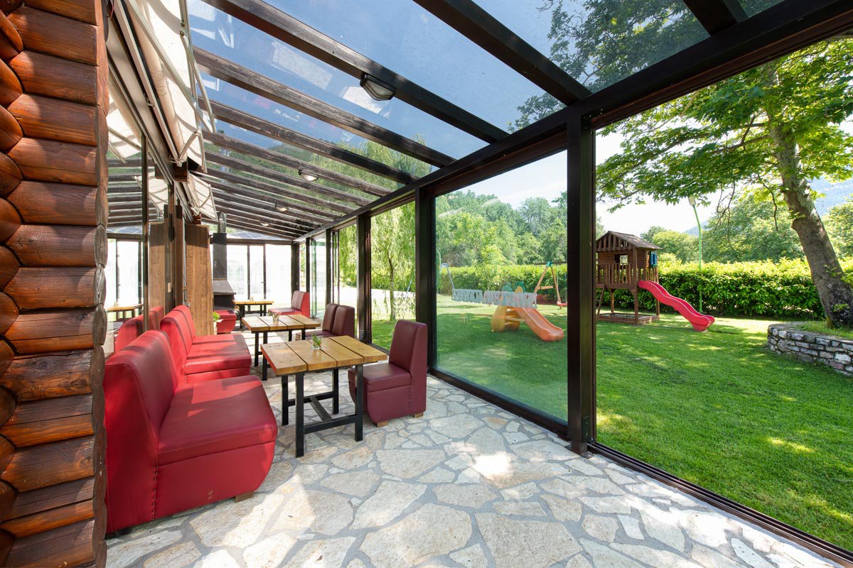 Patio with a view of a playground