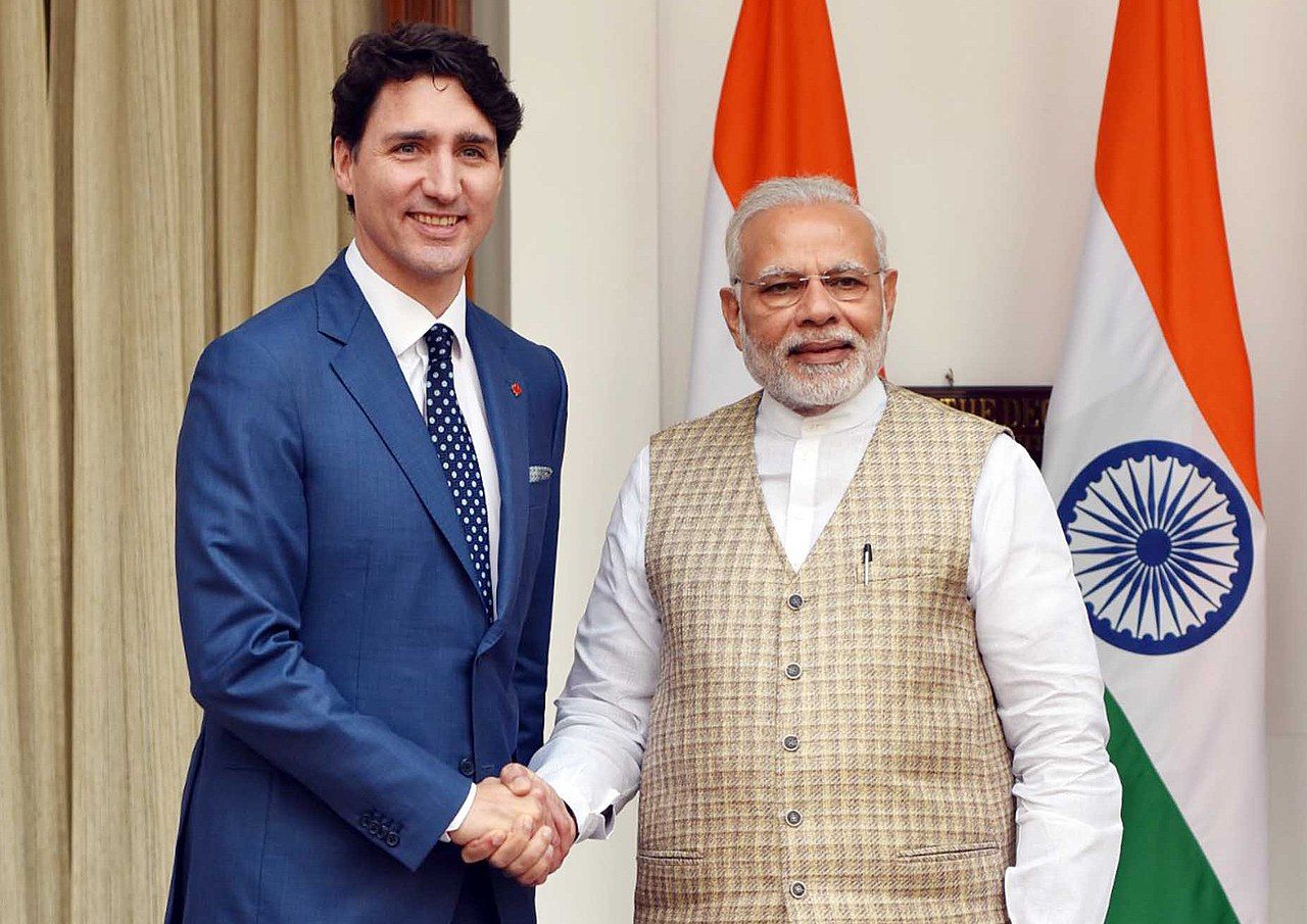 1280px-Justin_Trudeau_with_Narendra_Modi_at_Hyderabad_House_in_New_Delhi_-_2018_(cropped).jpg