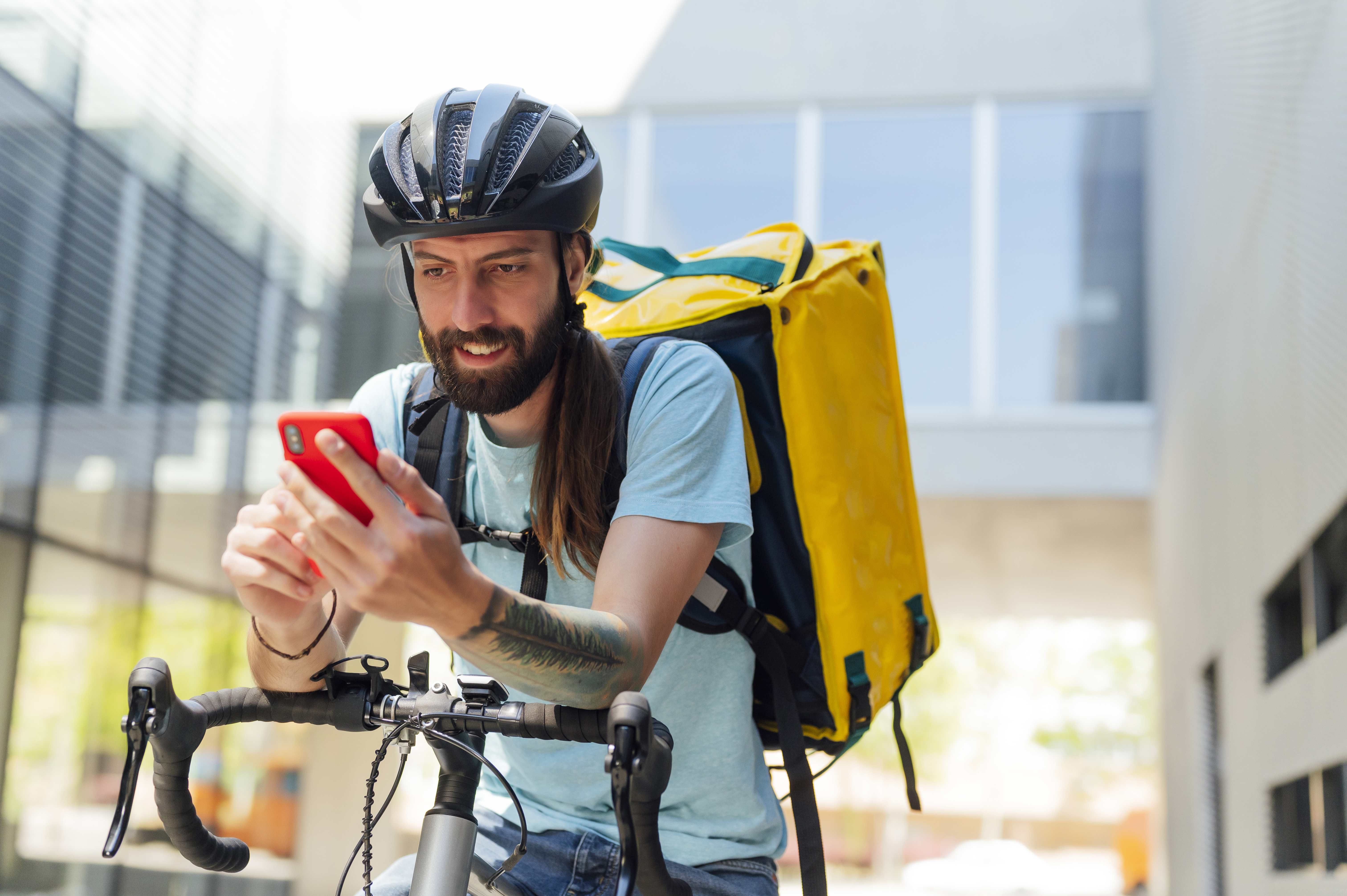 Delivery riders say AI algorithms cut pay and worsen working conditions