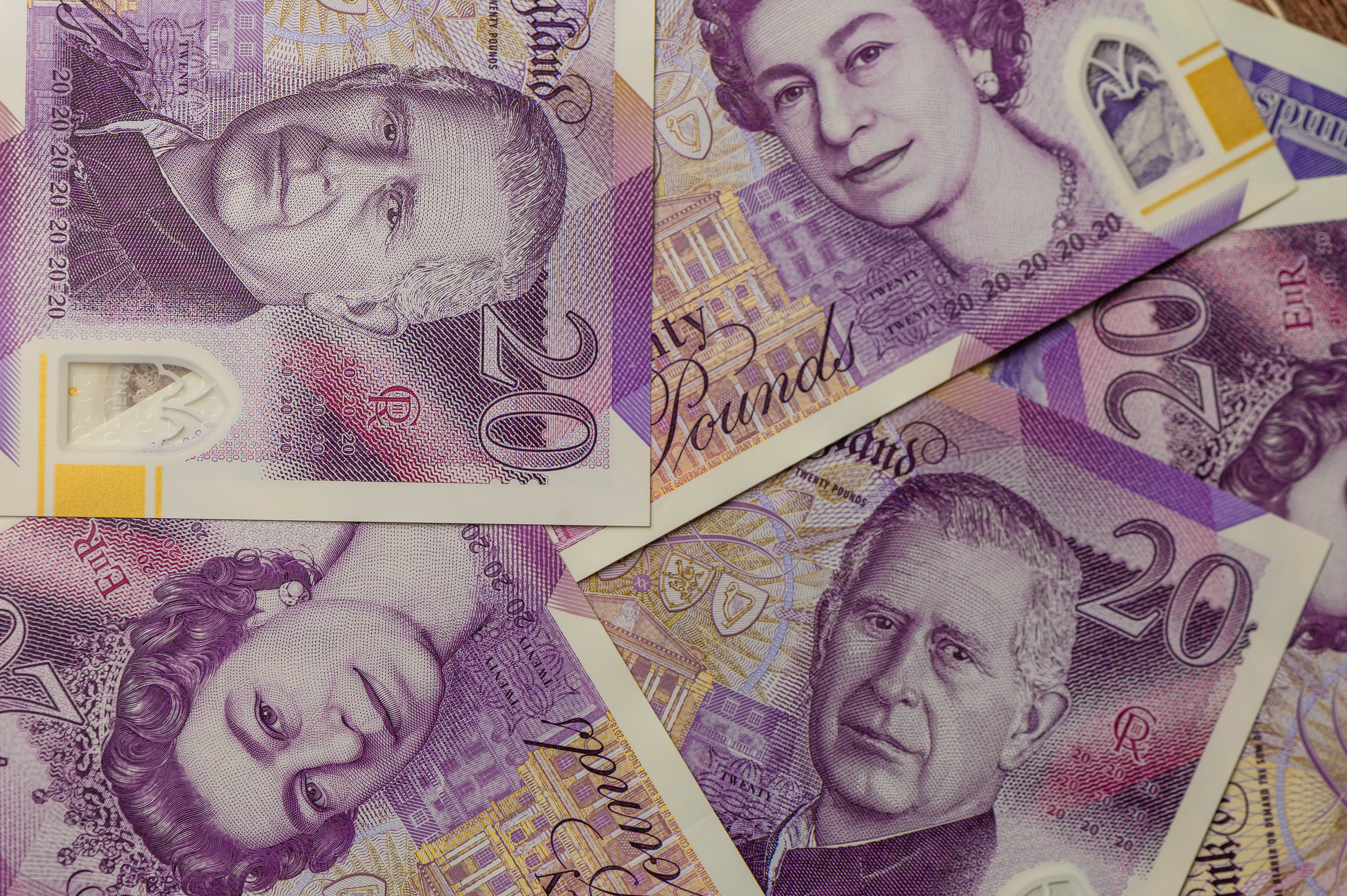 Pound climbs to $1.3560 against the dollar before new UK economic data