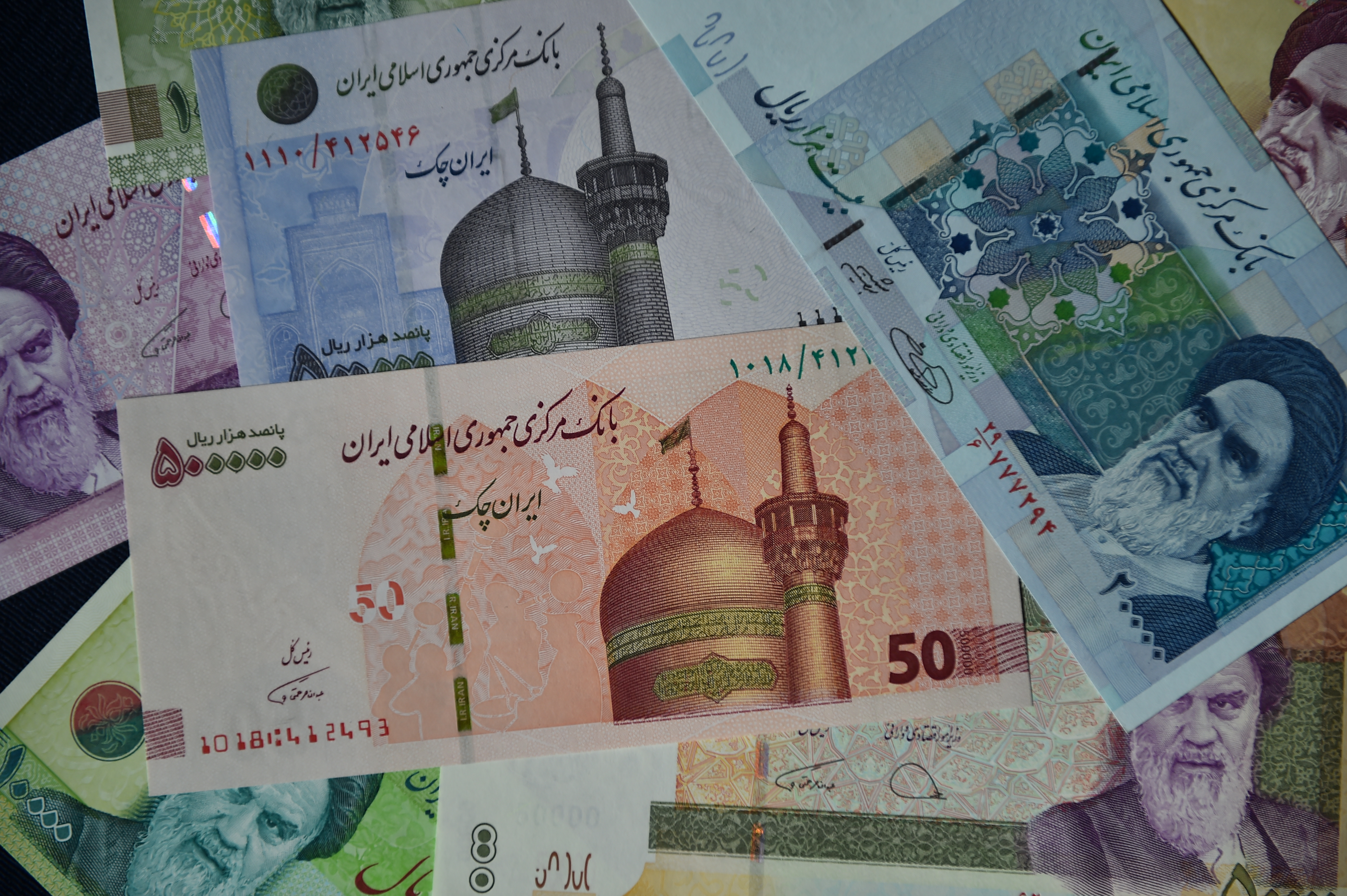 Iran's currency hits record low as its leaders admit strain