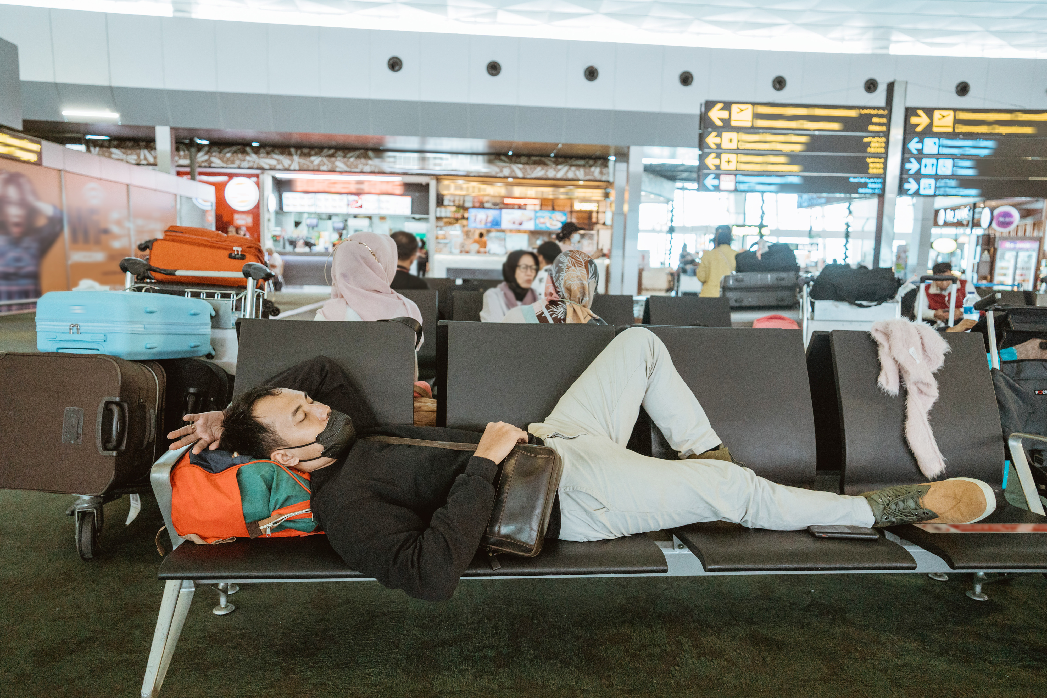 7,000 people sleep in Tokyo Narita airport after 'extremely unusual' rains disrupt rails routes