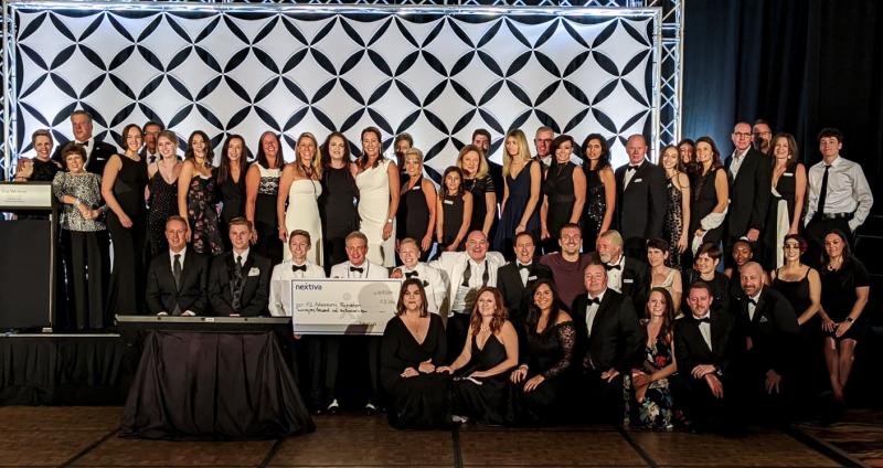 Nextiva Delivers a Huge Check to K2 Adventures Foundation Annual Gala