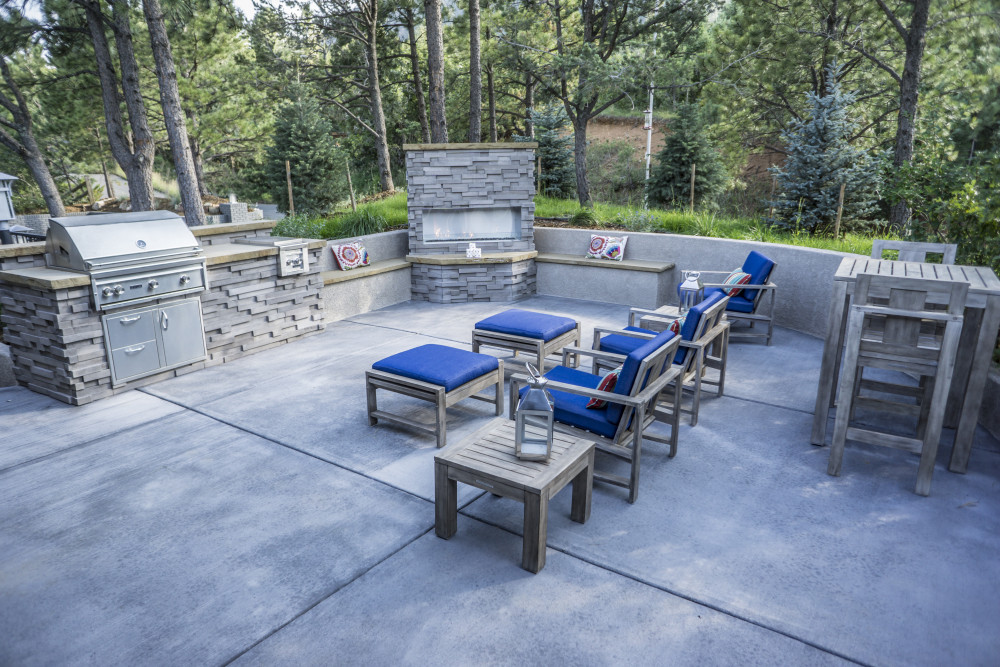 Hillside Outdoor Living with Natural Water Feature