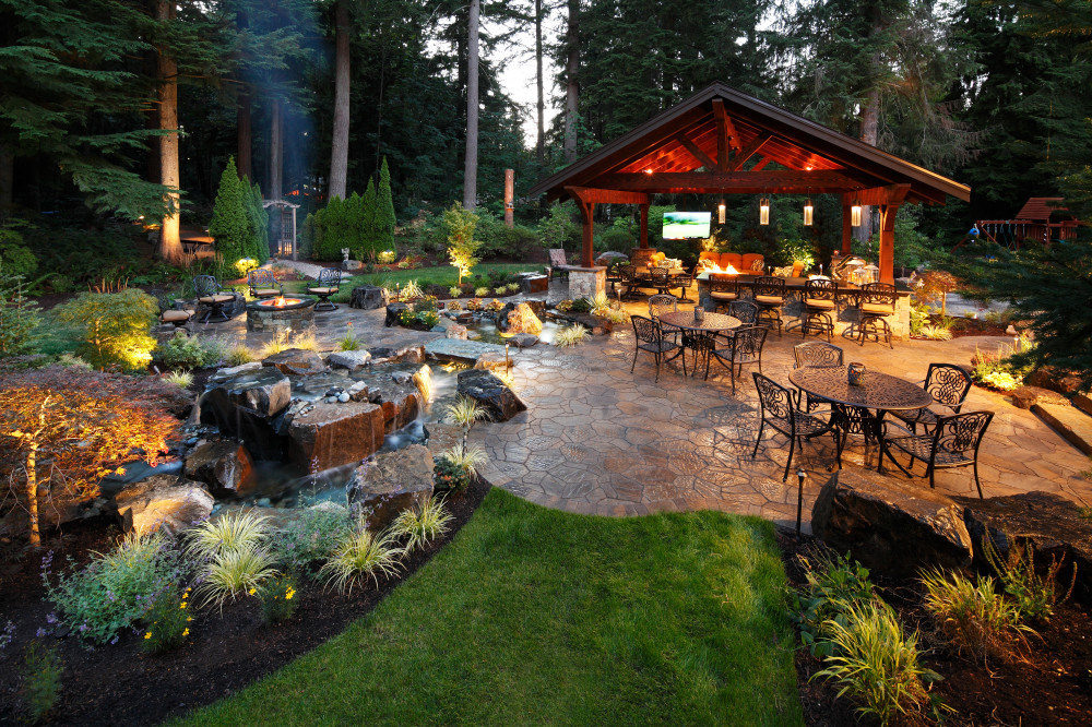 outdoor resort and living space with water feature