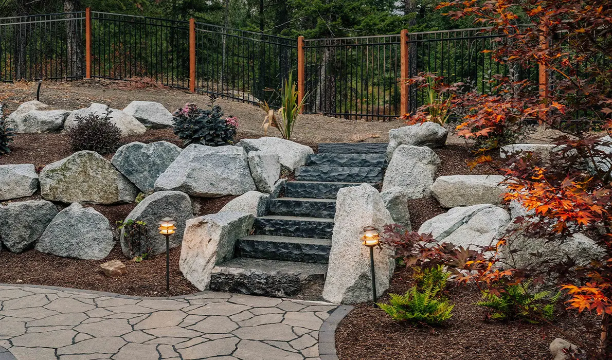 Bold Iron & Natural Stone, a Cross Creek landscape project