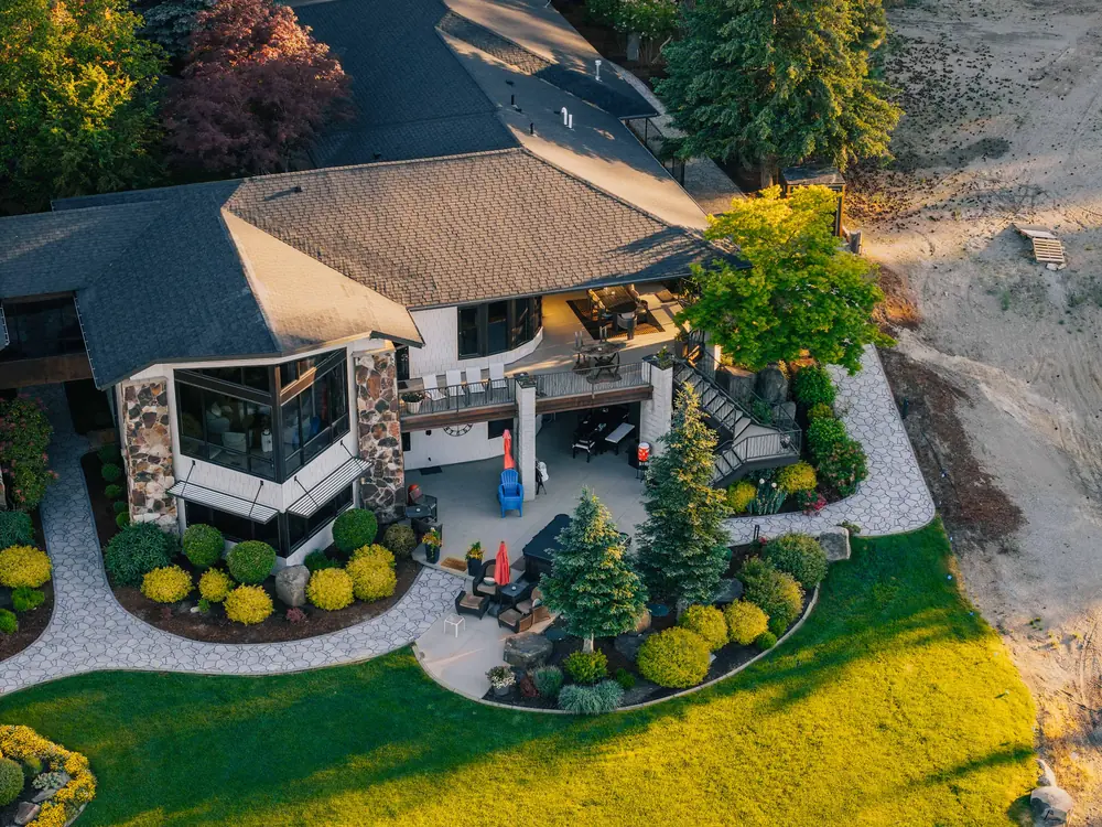 Beds wrapped between walkways and home to create a cozy and beautiful landscape — Garden Beds by Cross Creek