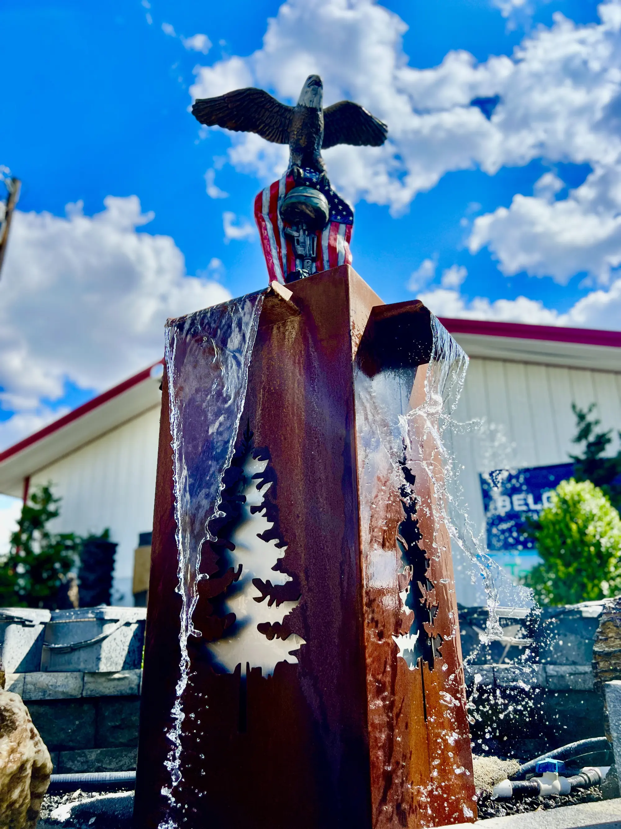 Rusted Steel 4 way tree spillway