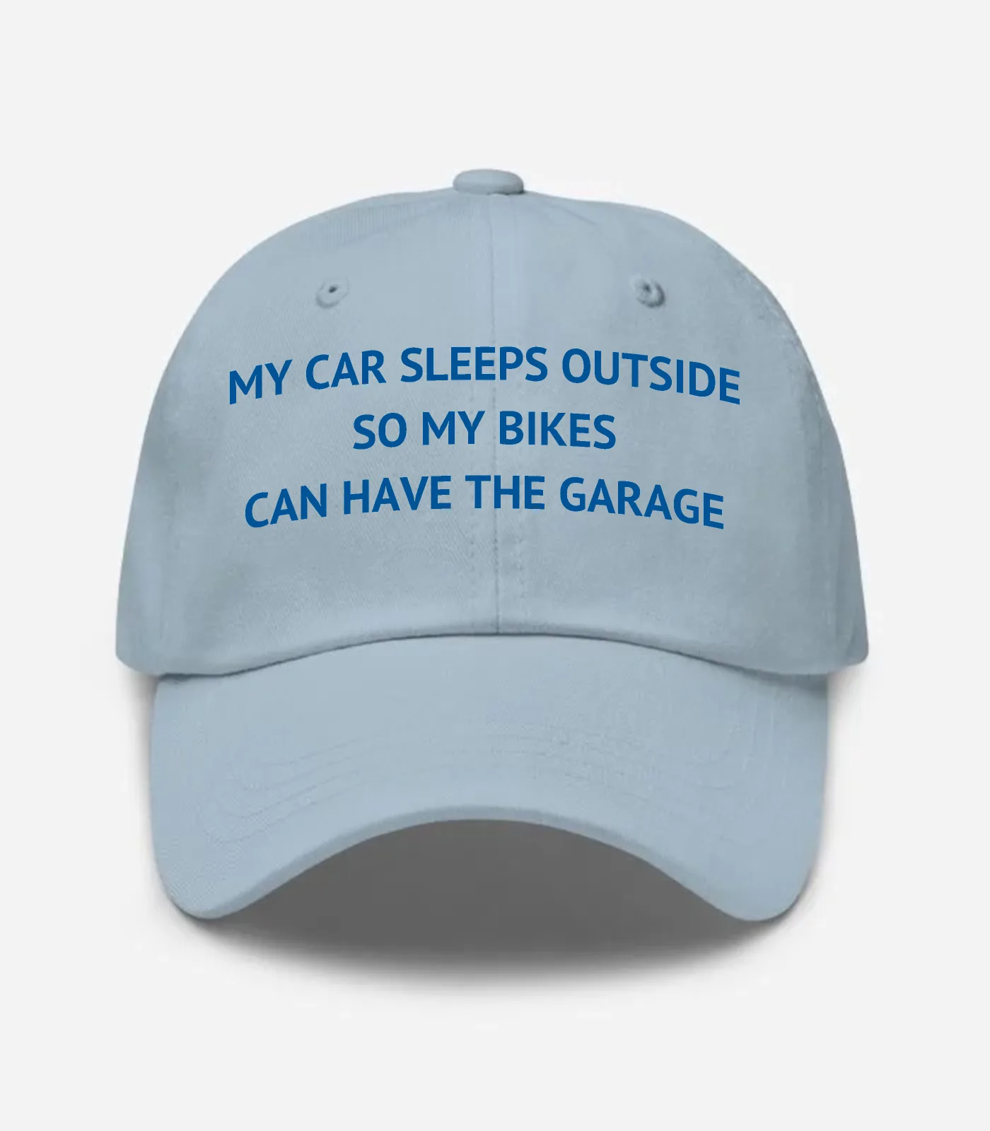 My Car Sleeps Outside So My Bikes Can Have The Garage Hat - Light Blue
