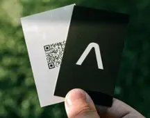 Print advertising materials including business cards, coasters, and flyers for designers