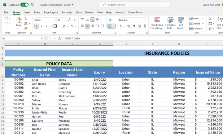 Excel report section heading merged and centered across four columns