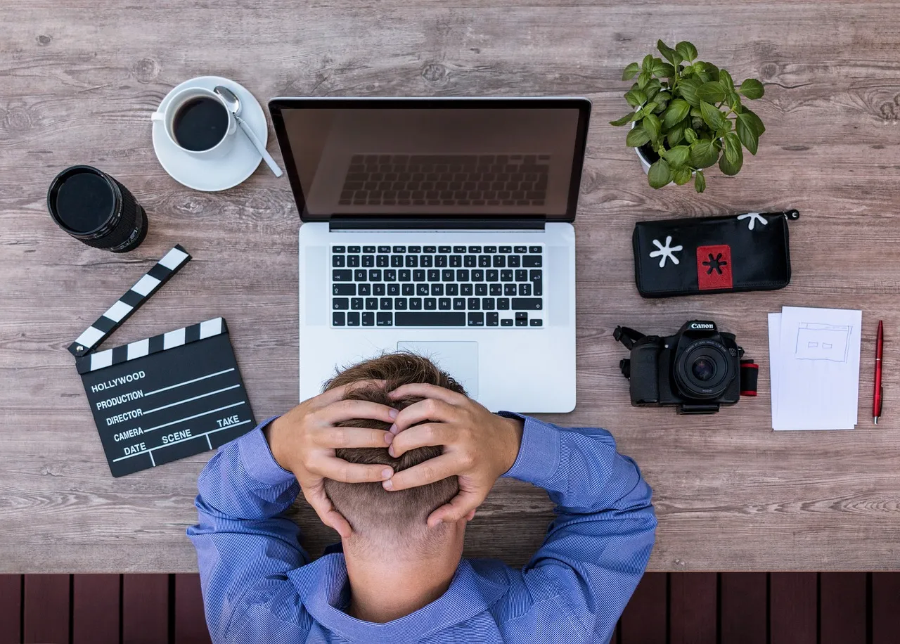 frustrated man cannot write book