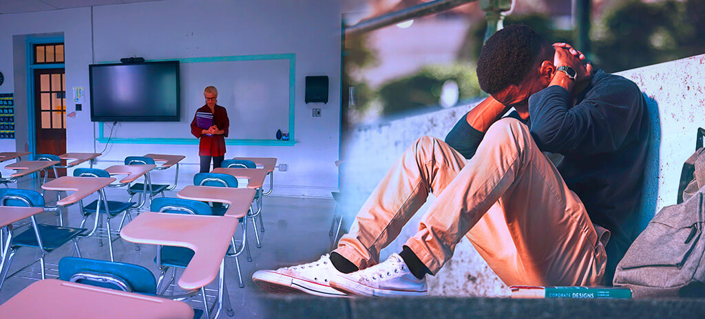 sala de aula vazia e aluno pensativo