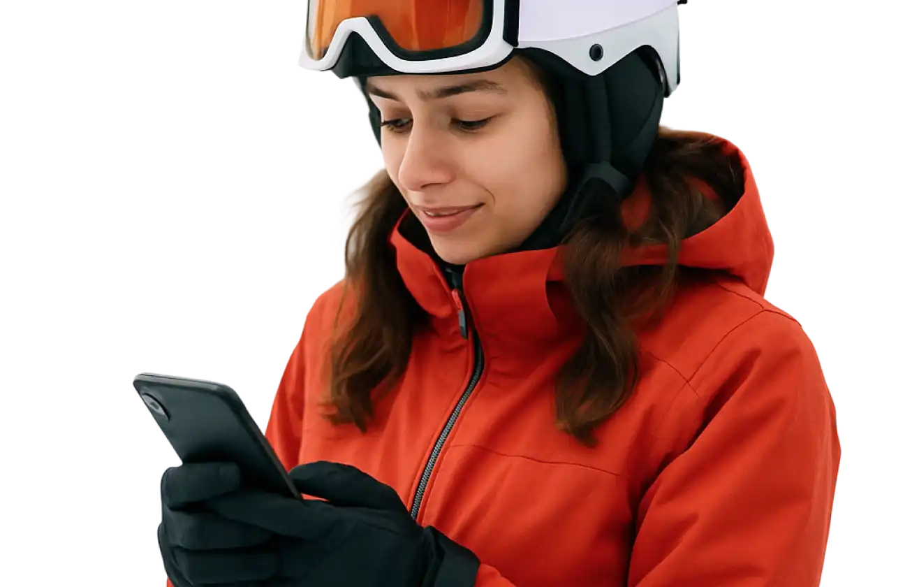 Skier holding a smartphone