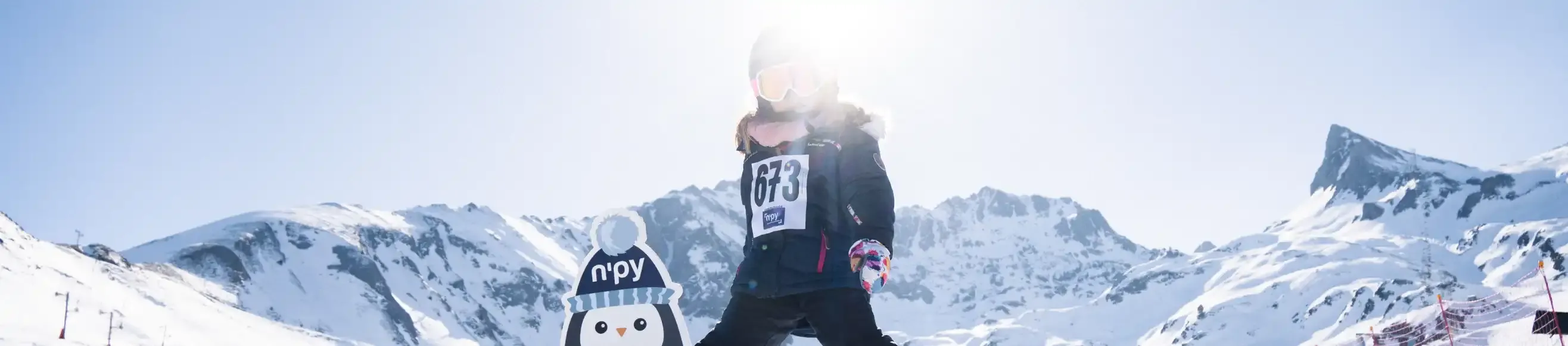 Children learning to ski under the sun at Luz Ardiden