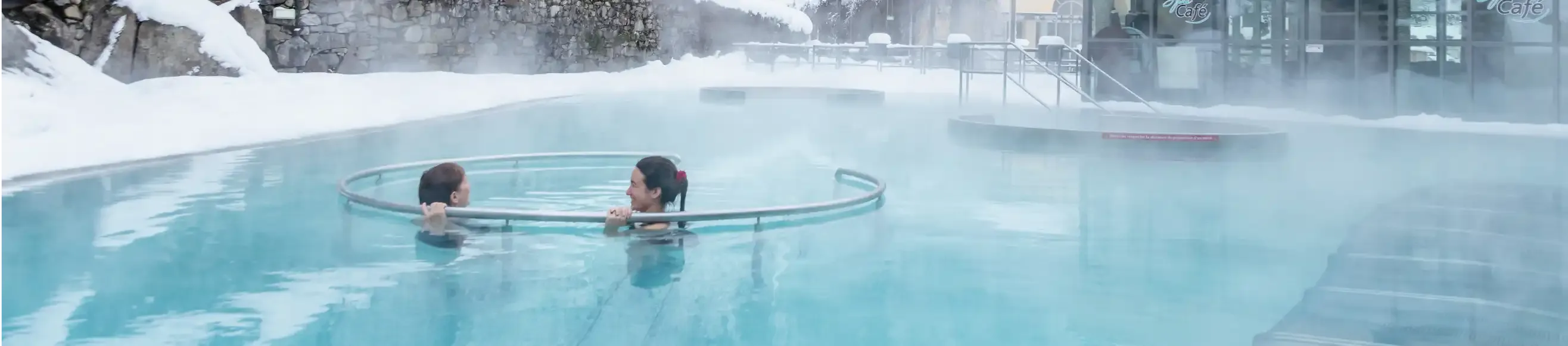 Two people relaxing at the Bains du Rocher in Cauterets