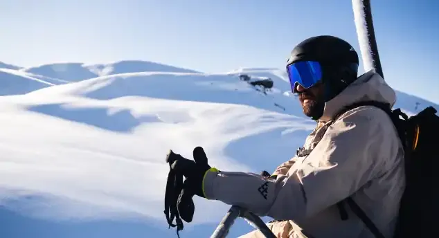 Skier on a chairlift in Cauterets