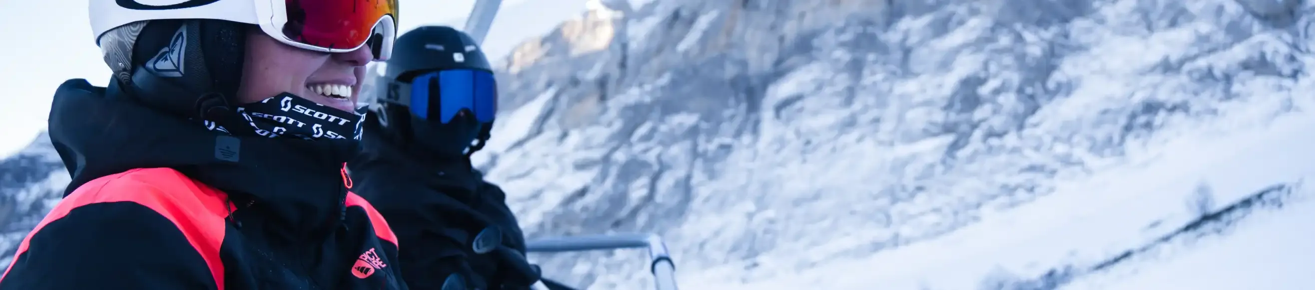 Two people on a chairlift in Gourette