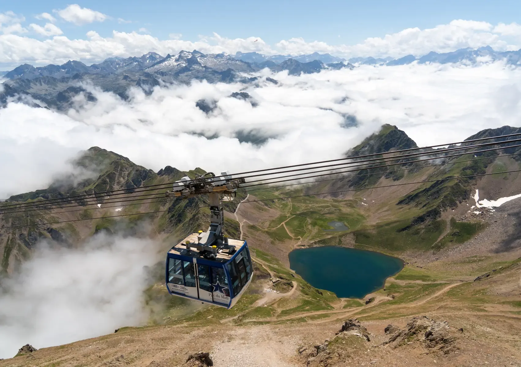 Gondola ride in summer at Pic du Midi, ascending