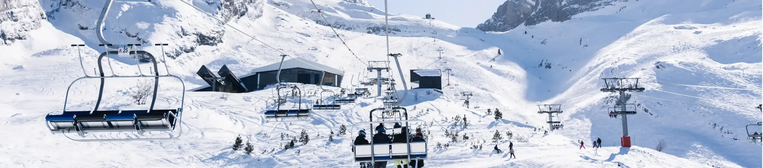 View from a chairlift in Gourette, sun and snow