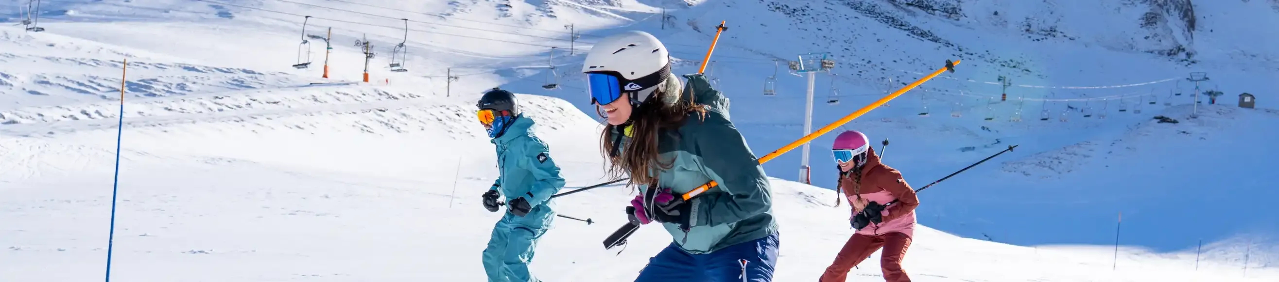 Group of smiling skiers on the slopes of Luz Ardiden