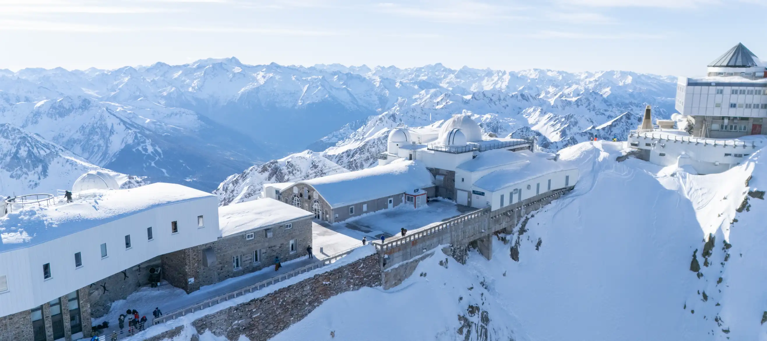 Aerial view of the Piuc du Midi and its terraces. Sun and snow