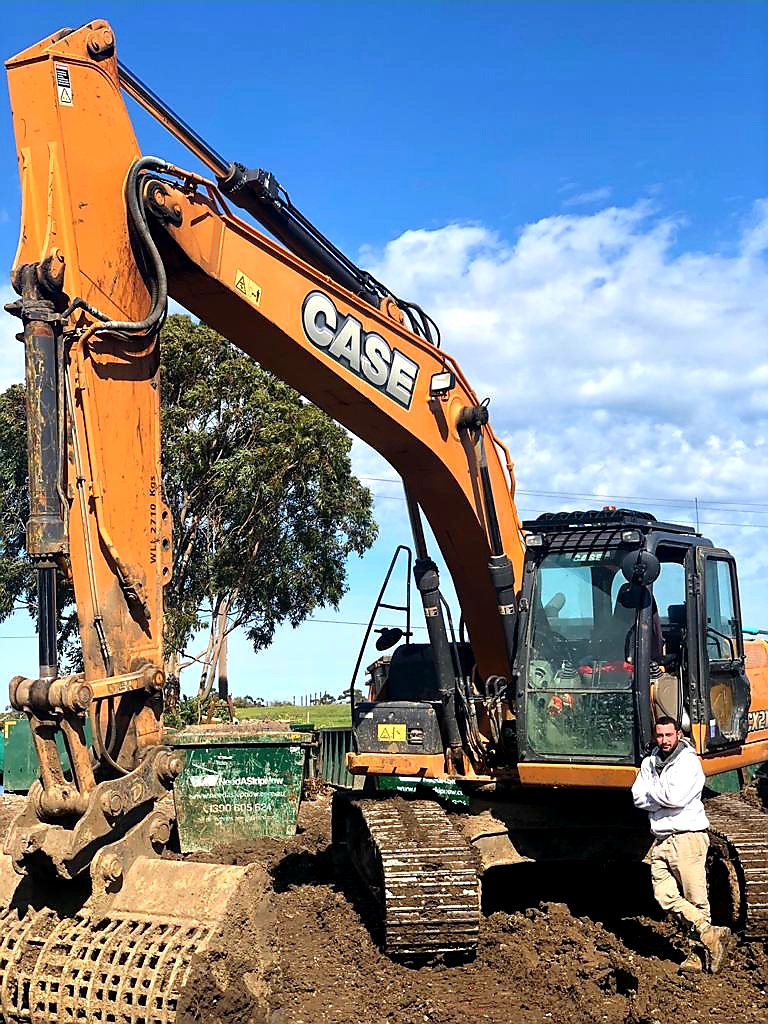 excavator operator about to dig soil