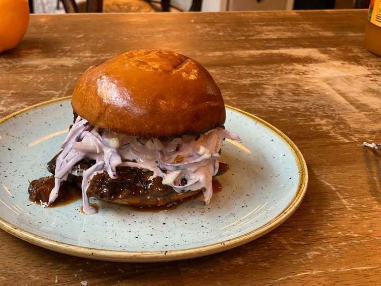 Pulled ox cheek burger, coleslaw, crispy shallots, truffle mayo