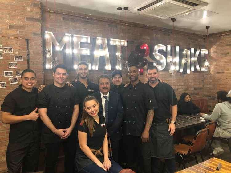 Usama Siddique (owner) and some of the Meat and Shake staff.