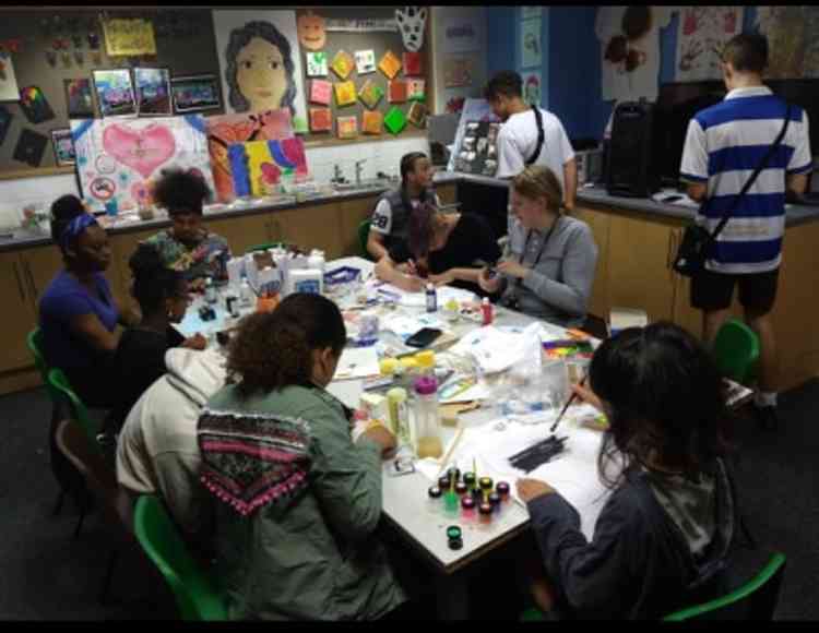 Children working on an activity inside the centre