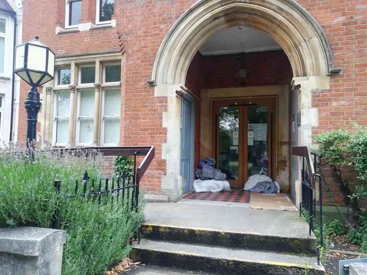 Sleeping bags belonging to the homeless have been left in the doorway