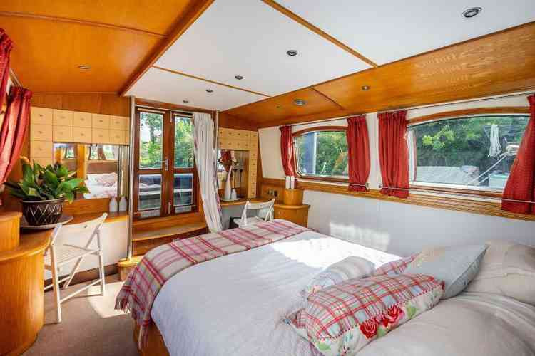 The houseboat boasts a double bed