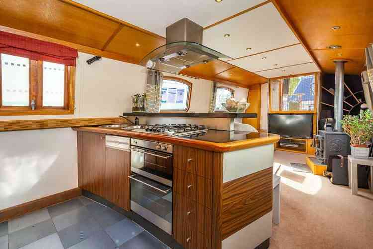 A glamorous floating two-double-bedroom flat is inside the boat