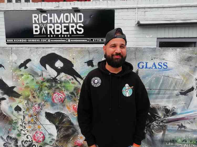 'You've got to keep moving with the times'. George opened Richmond Barbers in 2000 and is always innovating