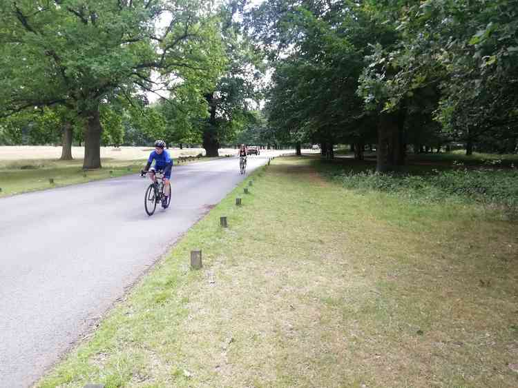 A cyclist heading towards Richmond Gate