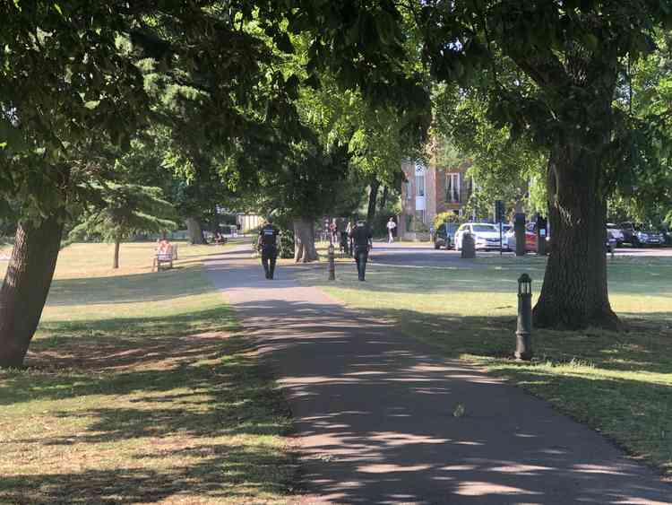 Two officers on patrol in Marble Hill Park (stock image)