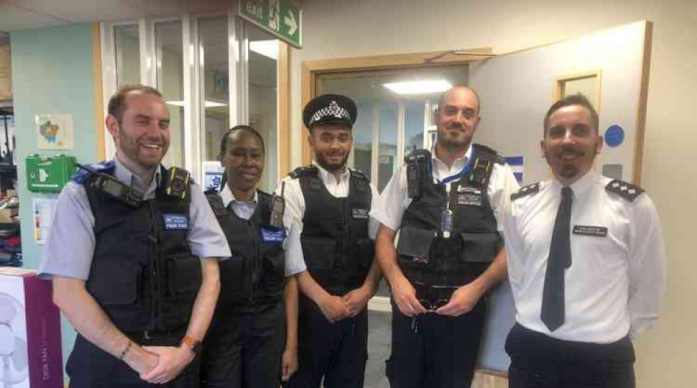 South West borough command unit Neighbourhood Chief Inspector Nicholas Hackett-Peacock, right, pictured with the new recruits and a police constable