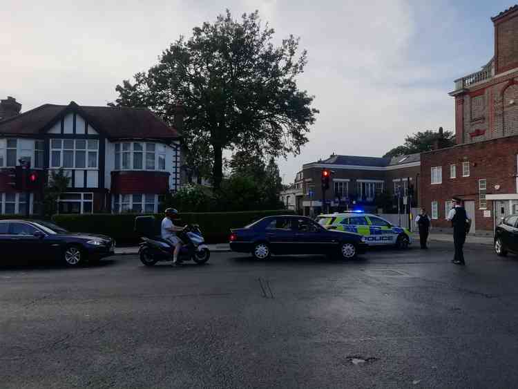 Police closed Rosslyn Road due to flooding