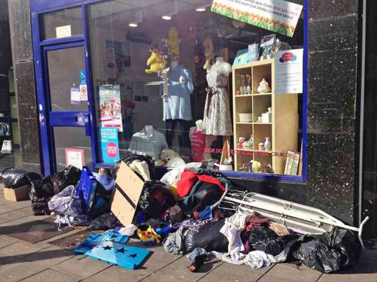 Leaving unwanted items outside a charity shop is fly-tipping and anyone doing it may be fined