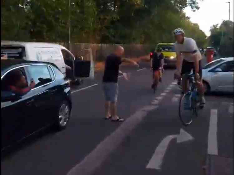 The man was telling cyclists to 'Stay to the left'