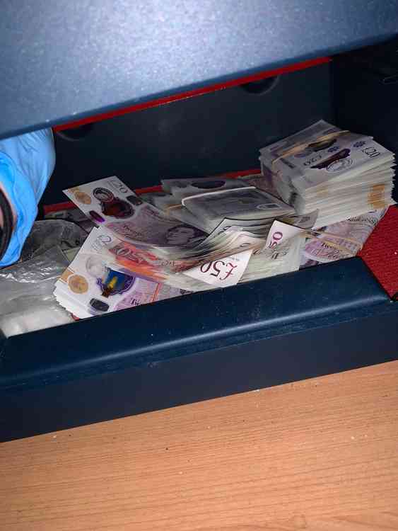 £22k in cash was found at a nearby home