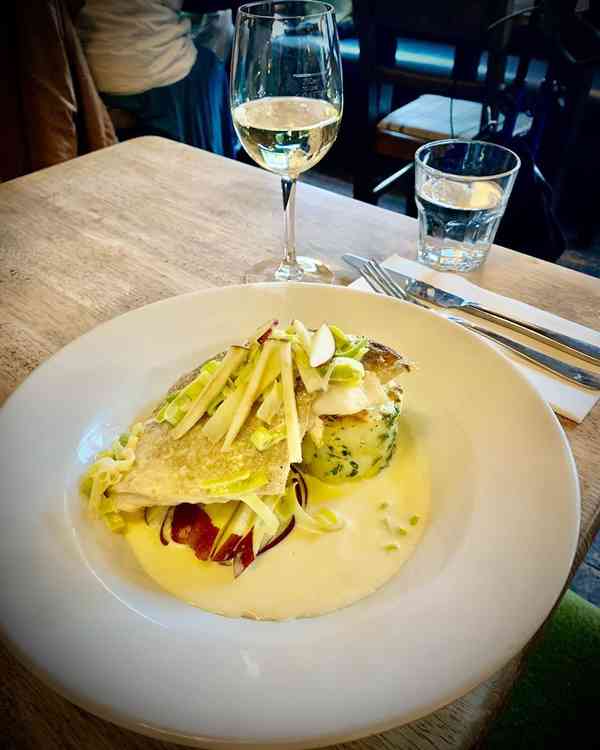 Pan seared haddock fillet, served with crushed new potato, apple and a creamed leek sauce @whiteswanrichmond