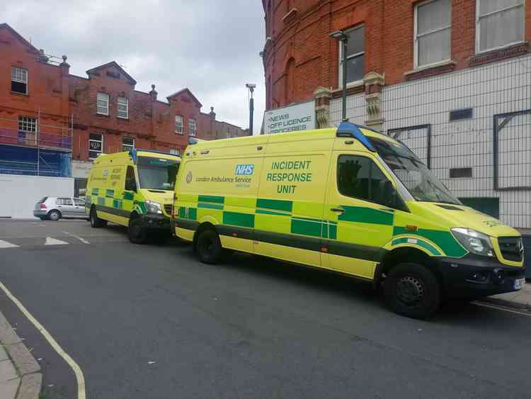 Ambulance vehicles at the scene