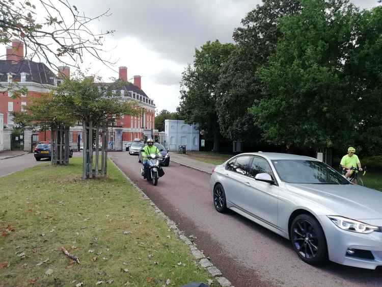 Vehicles entering the park at Richmond Gate