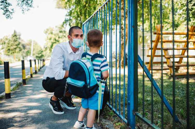 Parents are urged to wear masks at the school gates