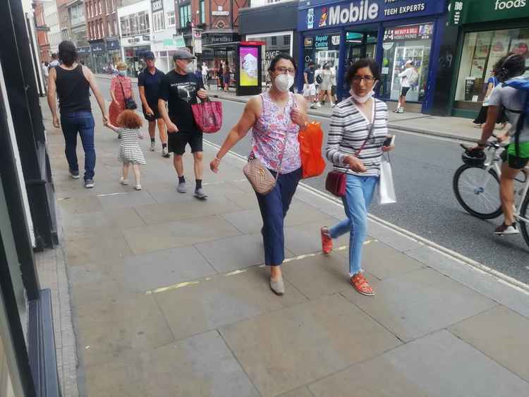 Two shoppers in Richmond town centre wearing their face masks