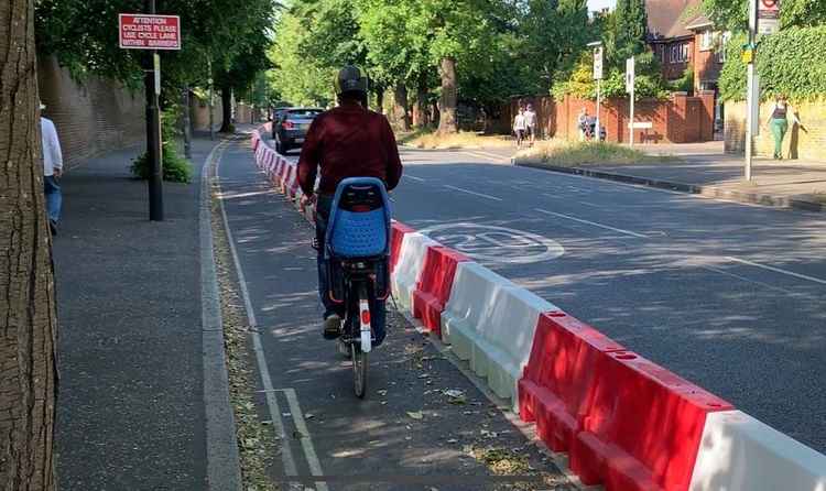 Water barriers were used to create temporary lanes for cyclists