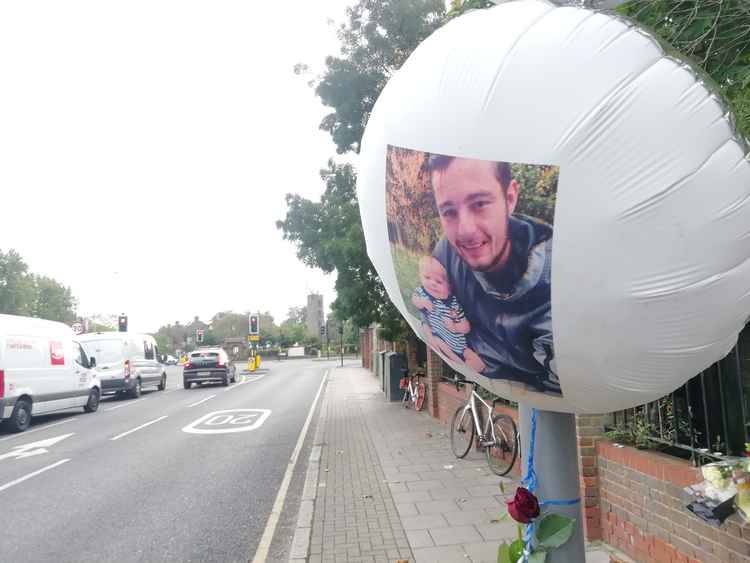Balloons and cans of Jack Daniels whiskey cola have been left in a highly personal tribute